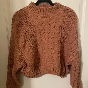 Pink turtleneck sweater